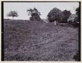 Trench round the barrow.